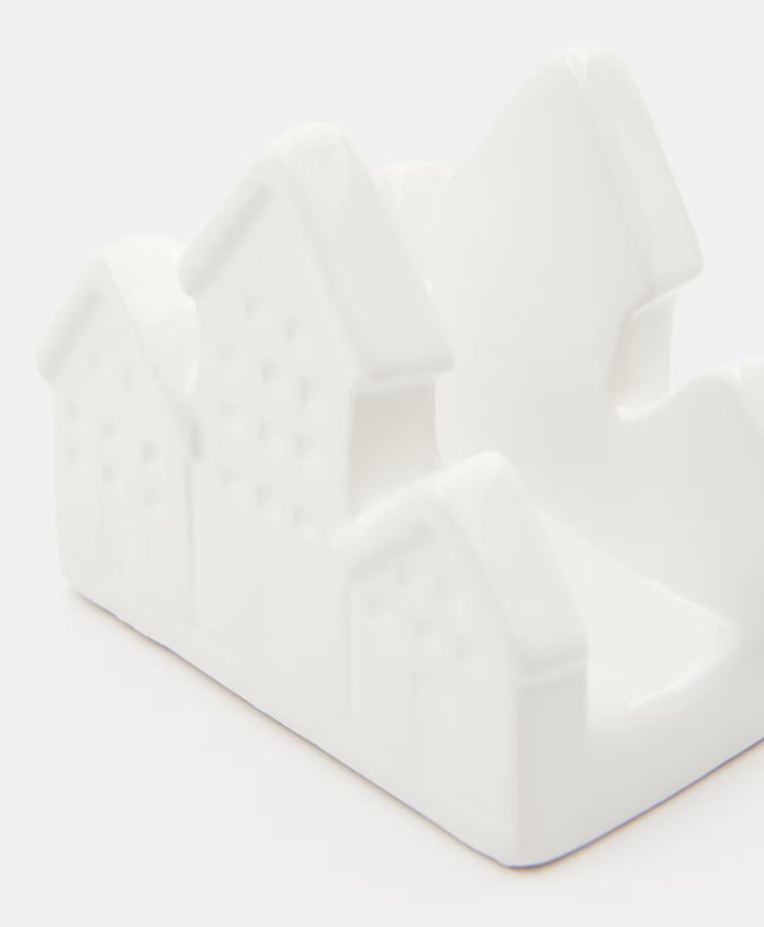 Biały serwetnik domki