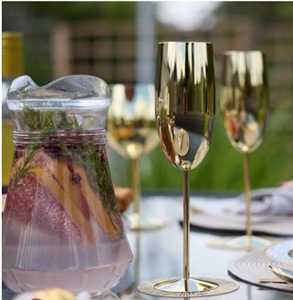 Złoty metalowy kieliszek do szampana w Połysku